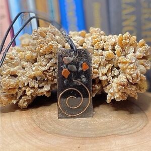 Orgonite pendant w/ brown leather cord